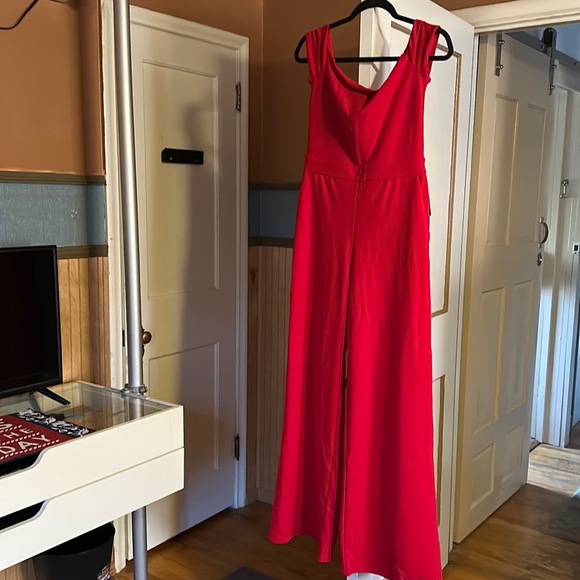 Express Pants - Express red flare leg jumpsuit. Never worn, tags attached. Originally 88.00